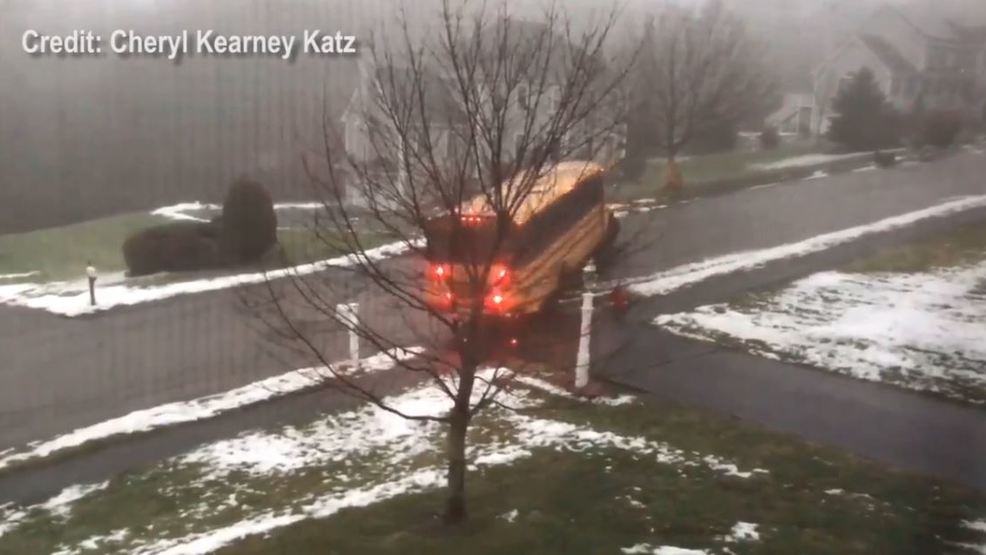 VIDEO School bus slides down icy hill in Massachusetts, crashes into
