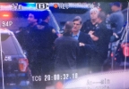 In this screenshot taken from a video camera viewfinder, Portland Mayor Ted Wheeler and Police Chief Mike Marshman can be seen conferring after police officers were involved in a fatal shooting Wednesday night near Southeast 92nd Avenue and Flavel Street. (Photo: Monty Orrick/KATU News) FullSizeRender.jpg
