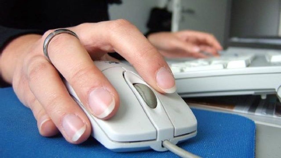 Hand on computer mouse internet web generic.jpg